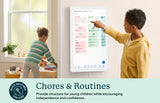 Children using the Skylight 27-inch digital family calendar to track chores and build morning routines on a wall-mounted smart screen.