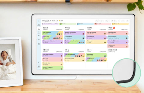 Color-coded weekly events organized on the Skylight 27-inch smart family calendar mounted on the wall.