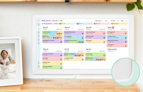 Color-coded weekly events organized on the Skylight 27-inch smart family calendar mounted on the wall.
